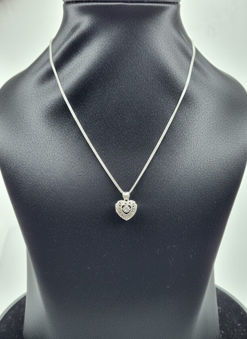 Ornate Heart Glow Silver Pendant