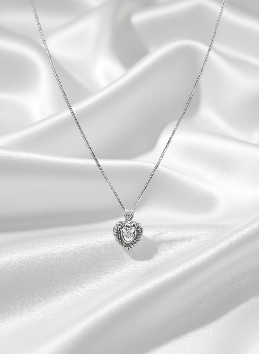 Ornate Heart Glow Silver Pendant
