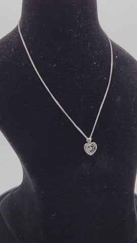 Ornate Heart Glow Silver Pendant